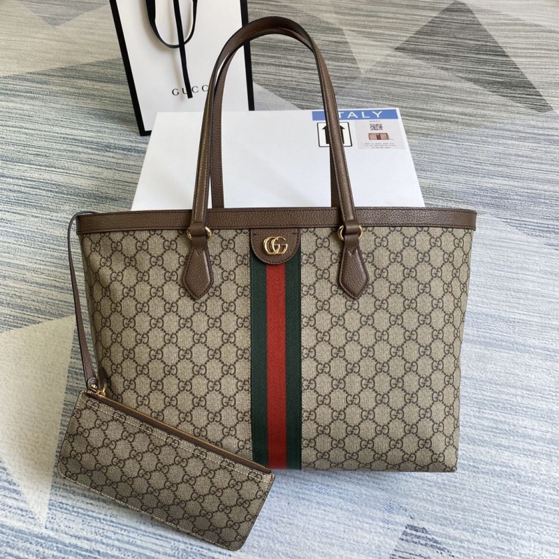 G*u*i shopping bags